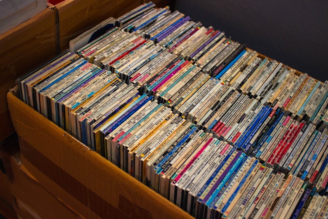 Shelves filled with old videotapes and film archive boxes