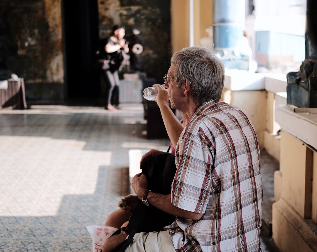 old family watching tv
